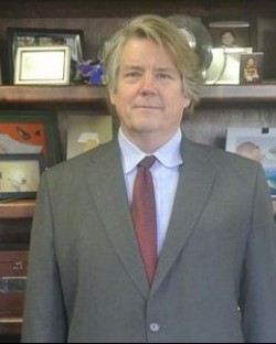 John E. Dunlap