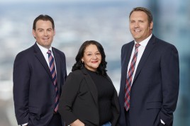 Attorneys Dustin E Smith and Michael Gruszeczki and Office Manager Maricella Rivera